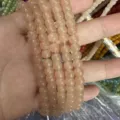 Detail view of peach-colored natural stone barrel beads for DIY jewelry crafting accessories - 5*6mm (Approx. 72 Pieces/Pack) / Lotus root pink