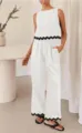 White two-piece set, sleeveless cropped top and wide leg pants with black scalloped trim. - S / Top And Bottom / White