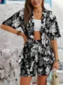 Completo due pezzi da donna con cardigan e pantaloncini stampa foglia tropicale nero e bianco - Taglia S / Top e Pantaloni / Stampa Nera