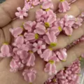 Macro view of pink shell powder pressed flower beads for DIY jewelry accessories - Style 2 / Pink