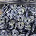 Bulk pile of natural blue sodalite 25mm donut beads for DIY crystal jewelry - Blue Spot Stone