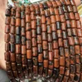 Macro detail of natural red and black mottled jasper cylindrical stone beads for DIY jewelry - Cylinder / 6*10mm (Approx. 39 Pieces/Pack) / Mahogany Obsidian