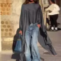 Top a maniche lunghe oversize con orlo irregolare abbinato a jeans larghi di stile. - Taglia S / Top / Grigio scuro