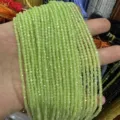 Detailed close-up view of light green faceted square zircon beads for DIY jewelry - Light Green Zirconia