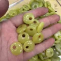 Natural pale green jade stone donut beads with side holes for DIY jewelry making - Lemon Jade