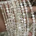 Weiße Perlmutt-Kleeblattperlen für die Herstellung von DIY-Schmuck - Kleeblatt-Form / 约6mm(约63颗左右一条)