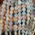 Faceted round disc opal-style beads for jewelry making, translucent iridescent white 10mm - 8*8mm*5mm (Approx. 25 Pcs/Strand) / Opal