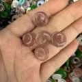 Detailed macro view of natural strawberry quartz donut beads for DIY jewelry making craft - 14mm / Strawberry Quartz
