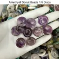 Detailed close-up of natural purple amethyst donut beads for DIY handmade jewelry making - 14mm / Purple Crystal