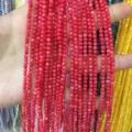 Detailed view of 3mm vibrant red round shell beads for DIY jewelry and crafting projects - 3mm (Approx 38cm Strand) / Red Shell Bead