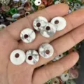 Detailed view of natural white marble stone donut beads for DIY necklace and bracelet making - White Howlite
