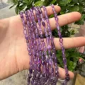 Macro detail of irregular purple amethyst nugget beads for DIY jewelry making - Purple Crystal