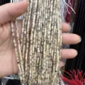Close-up detail of 2x2mm natural stone cylindrical beads for DIY jewelry making crafts - Feldspar Cylinder / One Strand (Approx 38cm)