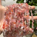 Close-up of irregular natural stone beads in assorted colors for DIY jewelry making - Persian Agate