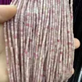 Macro detail of 2x2mm pink natural stone tube beads for DIY jewelry making. - Rhodochrosite Cylinder / One Strand (Approx 38cm)