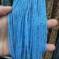 Macro detail of 2x2mm blue cylindrical natural stone spacer beads for jewelry DIY - Blue Turquoise Cylinder / One Strand (Approx 38cm)