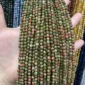 Vue détaillée de perles en pierre naturelle facettée de 4mm pour la création de bijoux - Perle Ronde Facettée Triangulaire / 4mm (Environ 90 Pièces/Fil) / Unakite