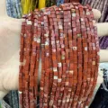 Macro detail of 3x3mm red natural stone cube beads for DIY jewelry making and bracelets - Natural Red Jasper