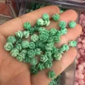 Close-up view of small green shell powder carved rose beads with horizontal holes - Approx 6mm / Turquoise (10)