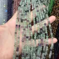 Gros plan de perles en pierre naturelle de fluorite facettées de 4 mm pour bijoux - Perle Ronde Facettée Triangulaire / 4mm (Environ 90 Pièces/Fil) / Fluorine Violette
