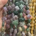 Vue macro détaillée de perles en croix en agate naturelle colorée pour la création de bijoux - 12x12x6mm (Environ 17 Pièces/Paquet) / Agate Indienne