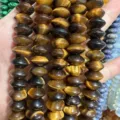 Macro view of high-quality natural tiger eye saucer-shaped stone beads for DIY jewelry making - 6*12mm (Approx 33 Pieces/Strand) / Tiger Eye