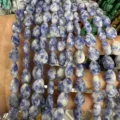 Close-up of faceted blue and white mottled natural stone drop beads for DIY jewelry - Blue Spot Stone