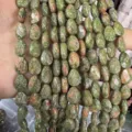 Close-up of faceted tear-drop shaped unakite beads for jewelry making - Unakite