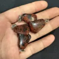 Macro view of natural stone trapezoid pendants with red and black spotted texture - Mahogany Obsidian / 15*20mm (Single)