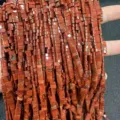 Macro detail of natural red jasper 3x5mm double-hole rectangular stone beads for DIY jewelry - 3x5mm (About 130 Pieces/Pack) / Natural Red Stone