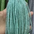 Close-up of 3mm faceted green cat-eye stone beads for DIY jewelry making. - 3mm (Approx 120 Beads/Strand) / Mint Green