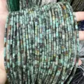 Macro detail of 3x6mm cylindrical natural stone tube beads for DIY necklace bracelets - 3*6mm (Approx. 60 Beads Per Strand) / African Pine Stone