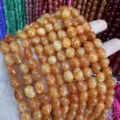 Strang aus orangefarbenen, ovalen, halbdurchsichtigen Natursteinperlen für DIY-Schmuck - Ca. 6*9mm (Ca. 38cm Strang) / Roter Aventurin Farbe