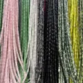 Close-up detail of 5x12mm natural stone bamboo beads in multiple colors for DIY jewelry - Approx. 32 Pieces/Pack / Rose Quartz