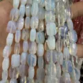 Close-up detail of faceted rectangular opalite stone beads for DIY jewelry making - Opal