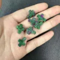 Detailed macro view of 12x16mm natural Ruby Zoisite cross loose beads for jewelry - Approx 12*16mm / 1 Bead / Ruby Zoisite