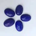 Lot de cinq cabochons ovales polis en lapis-lazuli bleu foncé pour la création de bijoux DIY - 6*8mm / Lot de 10 / Jade Bleu Synthétique