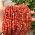 Handheld strands of 4-6mm natural irregular orange red agate beads for DIY jewelry - Southern Red Agate