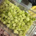 Light green shell powder embossed rose beads for DIY jewelry making and craft accessories - 3D Rose Flower (2025-26) / 50 Pieces/Pack (10mm) / Light Green
