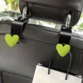 Car seat headrest hook universal back seat hanger black metal with green heart decor. - Style 4 / 1 Pair/Pack