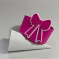 Silicone cup boot detail view, pink cup sleeve with cute bow design for 30-40oz water bottles - Rose Red