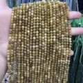 Yellowish brown faceted natural stone beads for DIY necklace and bracelet jewelry making. - 2mm Faceted Round Beads (Approx. 170 Pieces Per Strand) / Light Brown