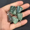 Close-up of natural green stone trapezoid pendants held in hand for jewelry making. - India Agate / 15*20mm (Single)