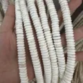 Macro view of natural white turquoise disc spacer beads for professional DIY jewelry making - 150 Pieces / 2x4mm / Howlite