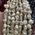 Perles de nacre baroques irrégulières en forme de dent pour bijoux DIY - Env. 20 mm (env. 20 perles par fil) / Beige