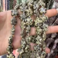 Dalmatian jasper stone beads in five-petal plum blossom flower shape for DIY jewelry making - 25 Pieces/Strand (15x15x5mm) / Spotted Stone