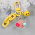 Kleurrijke ketting sleutelhanger met bel en glanzende zeshoekige hanger voor dagelijks gebruik. - Stijl 1