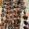 Red brown speckled natural stone plum blossom shaped loose beads for DIY jewelry making - 25 Pieces/Strand (15x15x5mm) / Mahogany Obsidian