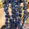 Natural blue stone plum blossom shaped beads for DIY jewelry making and unique crafts - 25 Pieces/Strand (15x15x5mm) / Enhanced Lapis Lazuli