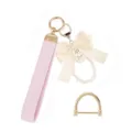 Cute pink woven wrist strap keychain with beige bow, pearl loop and gold D-ring for women. - Pink Bow / Single Piece